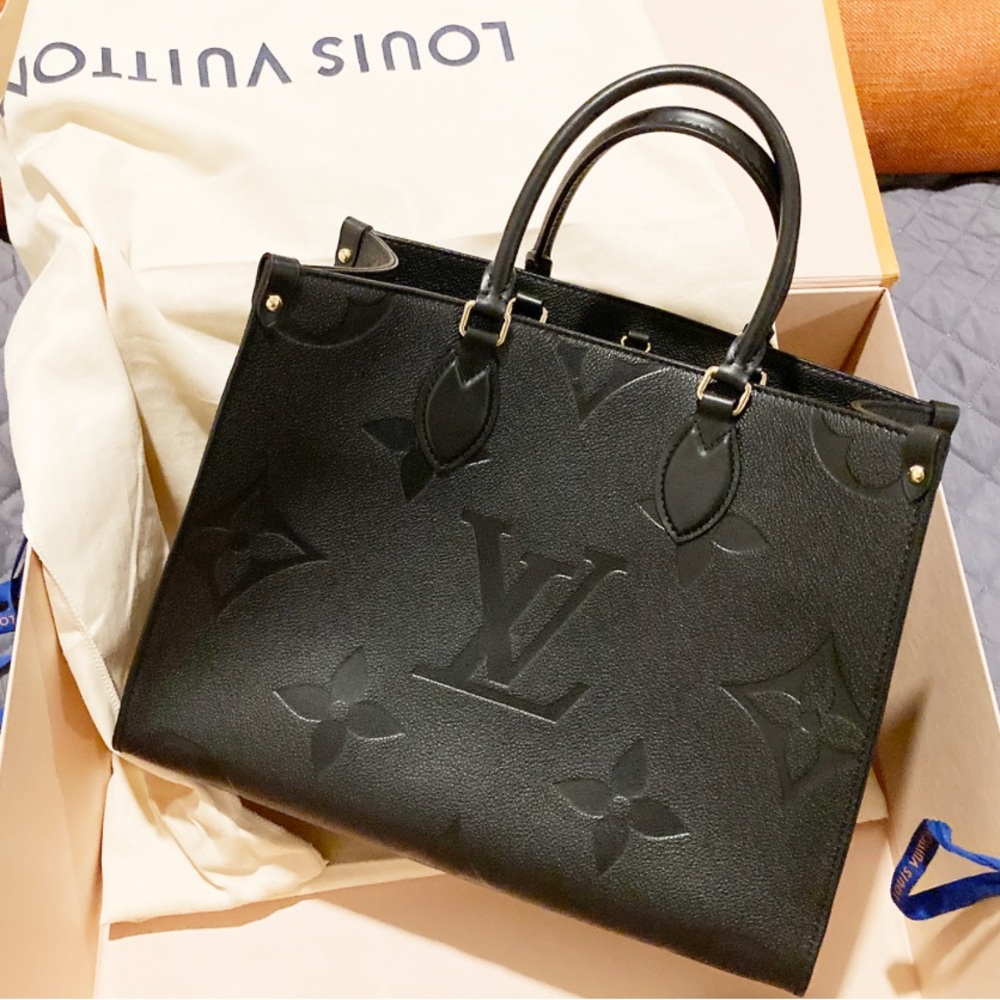 Louis Vuitton MM On the Go Emp Noir Excellent condition kept in box